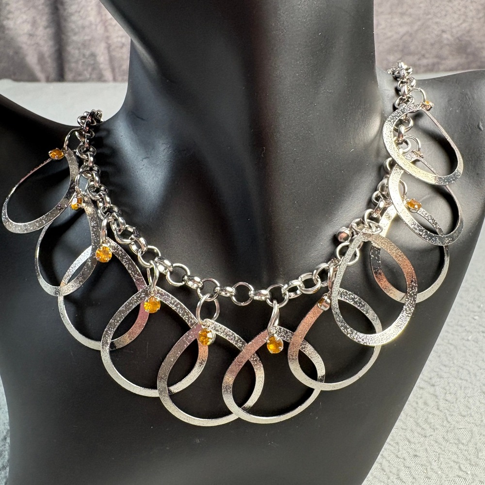 Silver Tone Textured Teardrop Hoop Statement Necklace Amber Rhinestone Accents